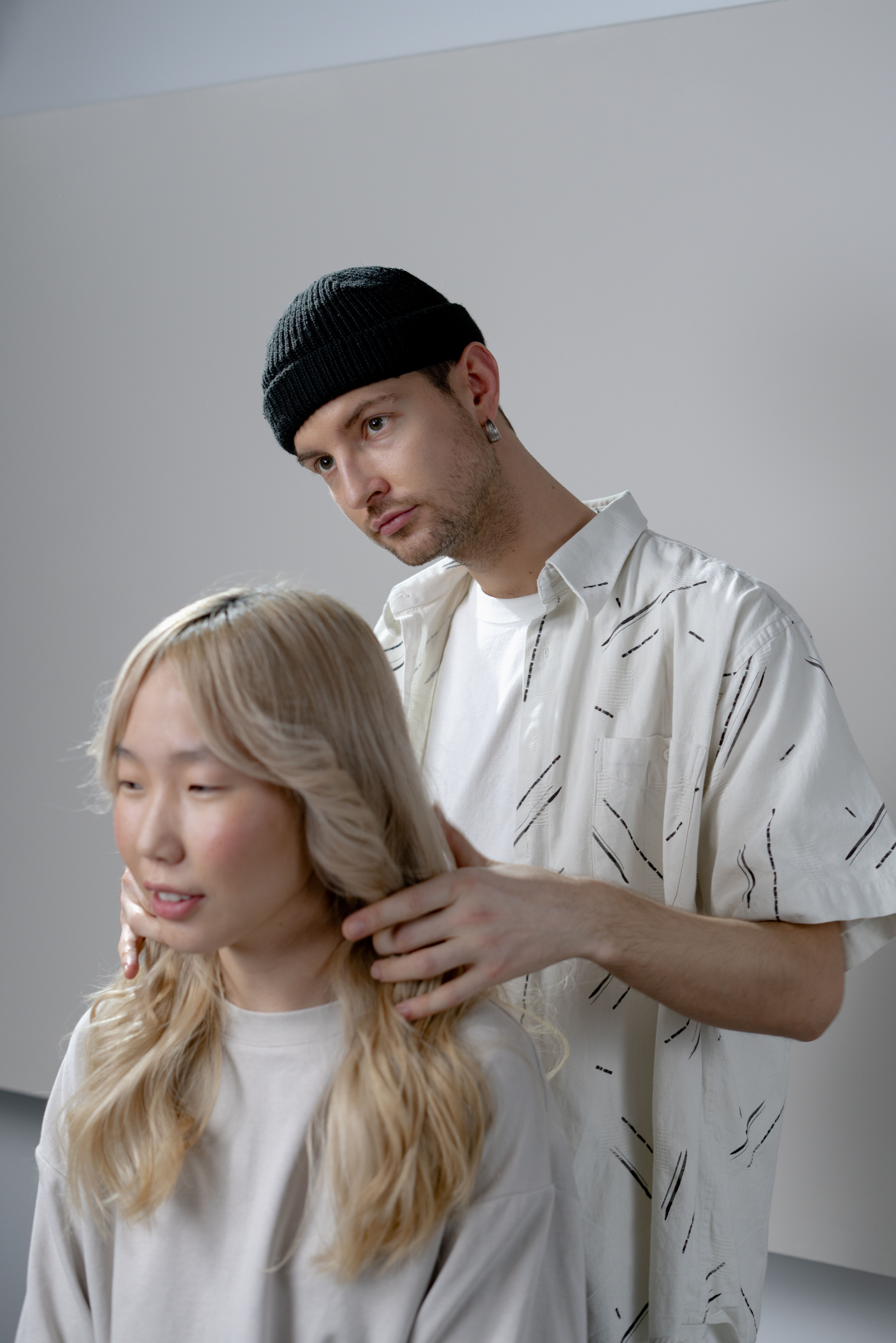 Stylist working with a client at Herbishh Salon